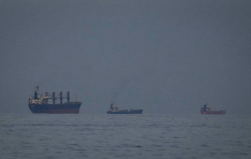 When will ships sail freely through the Strait of Hormuz again?