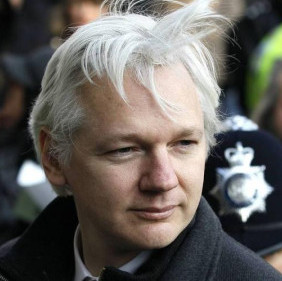 Assange released from British prison, left UK by plane