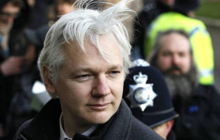 Assange released from British prison, left UK by plane